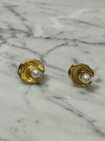 Aretes pegados