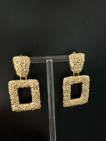 Aretes colgantes estilo marco